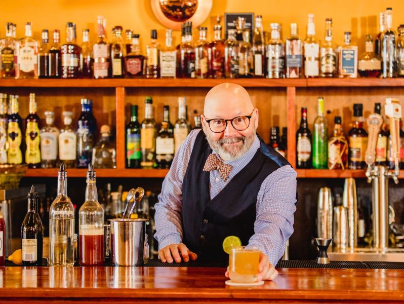 Owner Shannon Healy offers a cocktail at Alley Twenty Six.