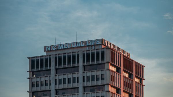 Sun sets on the NC Mutual Life Insurance building in Durham, NC.