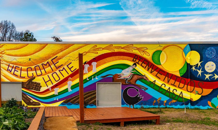 Clouds streak across the sky on a sunny day above the Lakewood Community Mural at El Futuro.